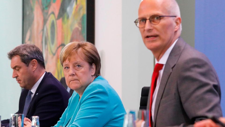 Beschlüsse zu Corona: Das sind die neuen Regeln Bayerischer Ministerpräsident Markus Söder, Bundeskanzlerin Angela Merkel und Hamburgs Erster Bürgermeister Peter Tschentscher