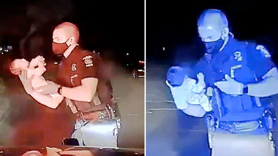 Ein Polizeibeamter rettet einem Säugling das Leben. Ein Polizeibeamter rettet einem Säugling das Leben.