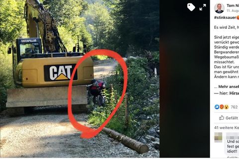 Screenshot Facebook: Mountainbiker drängelt sich an rechter Seite eines Baggers vorbei