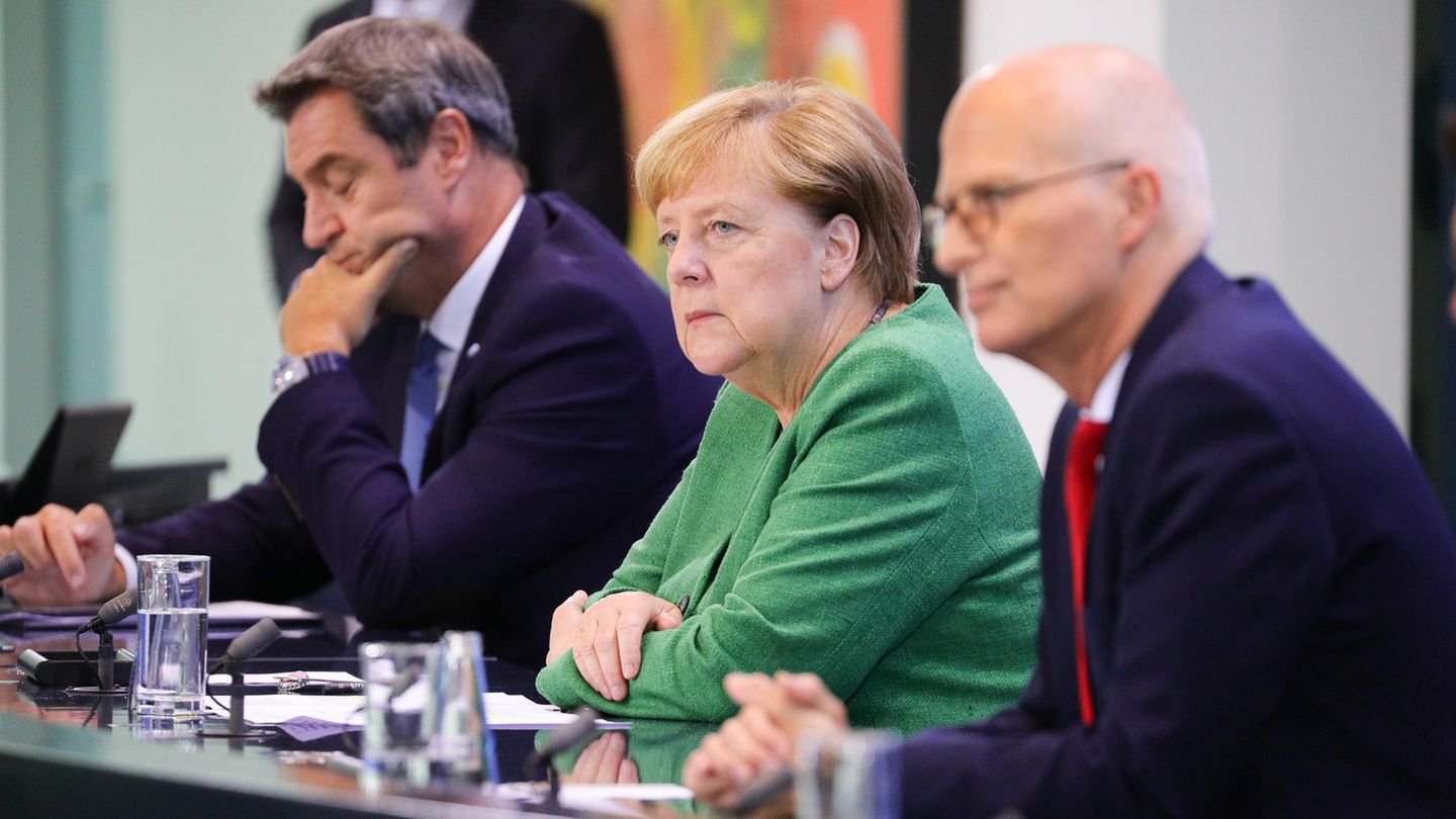Coronavirus: Verfolgt Deutschland die richtige Strategie? Das sagen Wissenschaftler Markus Söder, Angela Merkel und Peter Tschentscher bei einer Pressekonferenz