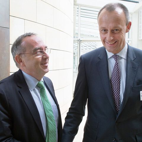 Links: Norbert Walter-Borjans (SPD) zusammen mit Friedrich Merz (CDU)