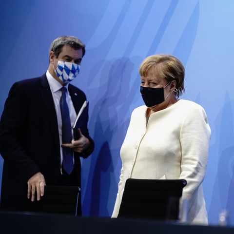 Von links: Markus Söder, Bundeskanzlerin Angela Merkel und Peter Tschentscher