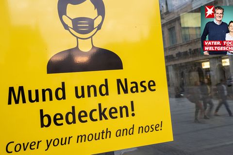 Schild mit der Aufschrift: Mund und Nase bedecken