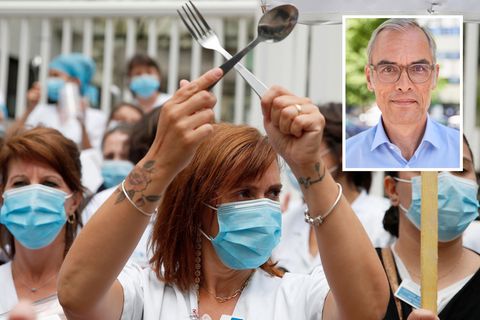 Eine Krankenschwester mit Mundschutz