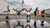 Female Artistics, B-Girl crew, on roof of Palast der Republik, during Red Bull BC1, Germany, 2004