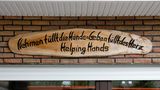 Schild von Helping Hand e.V.