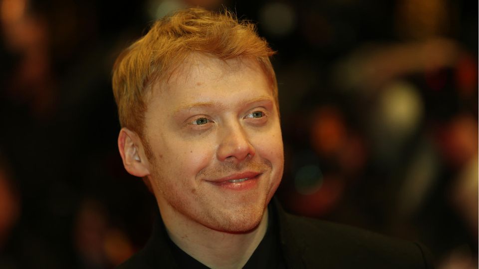 Rupert Grint lächelt
