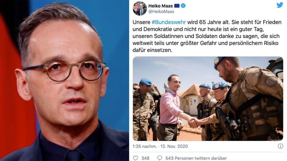 Bundesaußenminister Heiko Maas Bundesaußenminister Heiko Maas steht vor einer Deutschland-Flagge und spricht