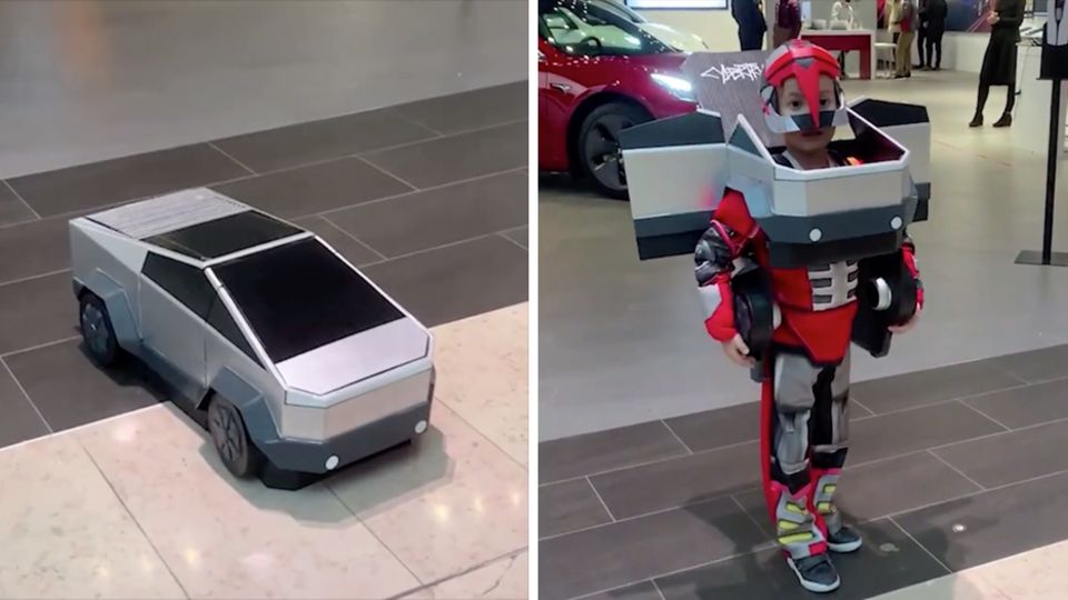 Links steht ein Modell des Tesla Cybertruck auf dem Boden, rechts steht ein Junge im "Transformers"-Outfit