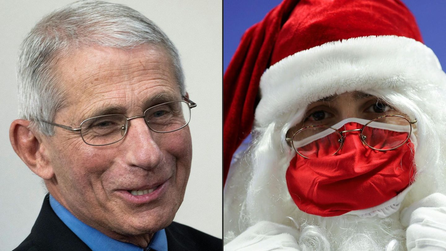 Anthony Fauci, Direktor des Nationalen Instituts für Infektionskrankheiten, und ein als Weihnachtsmann verkleideter Mann