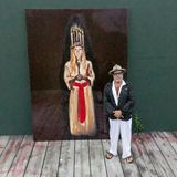 Julian Schnabel in front of the painting Portrait of Louise as St. Lucia, 2020