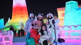 Posen für ein Erinnerungsfoto: Nach dem Coronajahr ist der Wintertourismus in China bereits wieder angelaufen.